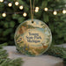 A circular ornament with a scenic illustration of Young State Park, Michigan, featuring a bird, deer, and a path through a forest.