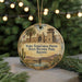 A round ornament featuring an illustration of Yuma Territorial Prison, a historic park in Arizona, with a desert landscape and a bridge in the background.