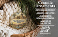 Ceramic ornaments, featuring a round ornament with a desert scene and a castle, are displayed in a basket.