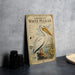 a vintage-style guide to the North American White Pelican, which is a large white bird with a long beak and legs.