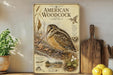 a vintage-style poster of an American Woodcock, a type of bird, displayed on a wall next to a wooden cutting board and some potted plants.