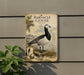 a sign for Barnacle Goose, a species of bird, with a detailed illustration of the bird and its natural habitat.