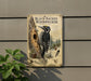 a metal sign with a black and white illustration of a black-backed woodpecker, mounted on a gray wall next to a plant.