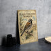 a vintage-style book or guide titled "Black-Throated Sparrow" with illustrations of a bird perched on a branch.