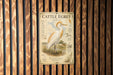 a poster of a white heron with a detailed illustration and text, mounted on a wooden wall.