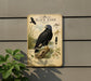 a vintage-style metal plaque with an illustration of a black hawk, surrounded by various bird species and natural elements.