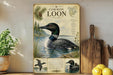 a picture of a common loon on a shelf