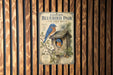 a sign for the Eastern Bluebird Pair at the Nest Box, which is a birdhouse designed to attract and house bluebirds.