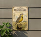 a vintage-style sign for the Eastern Meadow, with a yellow and black bird perched on a wooden post.