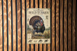 a poster of a wild turkey mounted on a wooden wall.