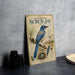 A vintage-style poster titled "Florida Scrub-Jay" featuring a blue bird perched on a branch with pine cones, nestled in a nest.