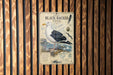 A vintage-style poster of a Great Black-backed Gull, featuring a detailed illustration of the bird and its natural habitat.