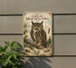 a vintage-style poster of a Great Horned Owl, mounted on a wall next to a plant.