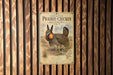 a sign with a picture of a bird, likely a prairie chicken, and text that reads "GREATER PRAIRIE-CHICKEN BOOMING".