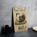 a vintage-style metal sign with an illustration of a Greater Sage-Grouse, a bird species, and some text.
