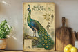 a vintage-style illustration of a peacock, with detailed botanical illustrations and text providing information about the bird.