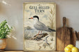 a vintage-style poster of a gull-billed tern, a type of seabird, displayed on a shelf next to a wooden cutting board and some potted plants.