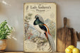 a poster of Lady Amherst's Pheasant, a colorful bird with a long tail, perched on a rock. The poster includes illustrations and text that describe the bird's appearance, habitat, and behavior.