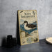 a vintage-style illustration of a Manx Shearwater, a type of seabird, with various bird illustrations and text providing information about the species.