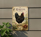 a vintage-style metal sign with a black and brown rooster, surrounded by various farm-related elements such as eggs and plants.