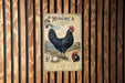 a vintage-style illustration of a black chicken, with a wooden background and vertical slats.