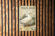 a poster or sign about the Pekin duck, which is mounted on a wooden wall.