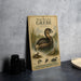 A vintage-style illustration of a pied-billed grebe, a type of water bird, is displayed on a wall.