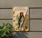a vintage-style metal plaque with an illustration of a red-breasted sapsucker, a type of woodpecker, perched on a tree trunk.