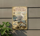 a metal sign with a detailed illustration of a red-legged Kittiwake bird, along with other birds and coastal elements.