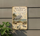 a metal sign with a detailed illustration of a ring-billed gull, accompanied by additional information about the bird.