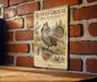a vintage-style sign for Ruffed Grouse Drumming, mounted on a brick wall.