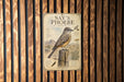 a poster of a bird perched on a wooden post, with a bird illustration and text.