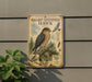 a metal sign with a picture of a sharp-shinned hawk, mounted on a wall.
