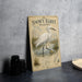 A vintage-style metal sign featuring an illustration of a snowy egret wading in a marshy area, with text describing the bird species.
