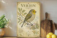 a vintage-style poster of a Verdin bird, which is a small, yellow and gray bird with a distinctive crest, perched on a branch. The poster is displayed on a shelf next to a wooden cutting board and a potted plant.