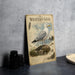 a metal sign with illustrations and text about the Western Gull, which is a bird species.