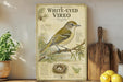 a vintage-style poster or painting of a white-eyed vireo bird perched on a branch, surrounded by various bird-related elements such as a map, a nest, and a field guide.