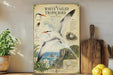 a vintage-style poster of a white-tailed tropical bird, with illustrations and text providing information about the bird.