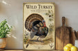 a poster of a wild turkey with a decorative border, displayed on a shelf next to a wooden cutting board and some lemons.