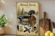 A vintage-style poster of a wood duck is displayed on a wall, surrounded by various kitchen utensils and a potted plant.