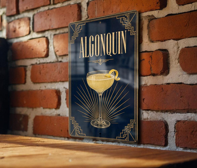 A sign with the word "ALGONQUIN" and an illustration of a cocktail glass is displayed on a brick wall.