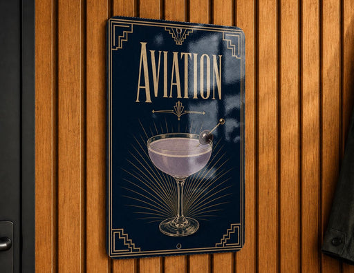 A sign with the word "AVIATION" prominently displayed, featuring an illustration of a martini glass with a cherry on top.