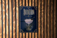 a sign with the word "AVIATION" prominently displayed, along with an illustration of a martini glass.
