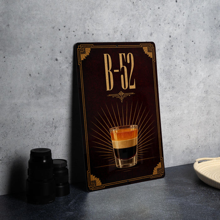 a poster or sign with a picture of a layered drink, possibly an espresso or cappuccino, along with the text "B-52".