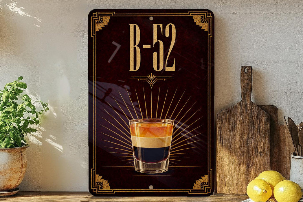 a sign with the text "B-52" and an illustration of a layered drink, likely a cocktail or mixed drink, with a glass in the center. The sign is displayed on a wall, and there are some kitchen items, such as a cutting board and a bowl, visible in the background.