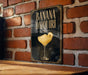 Banana Daiquiri sign on a brick wall