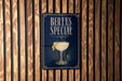 A sign for "Berta's Special" cocktail, featuring an illustration of a cocktail glass with a lemon twist.