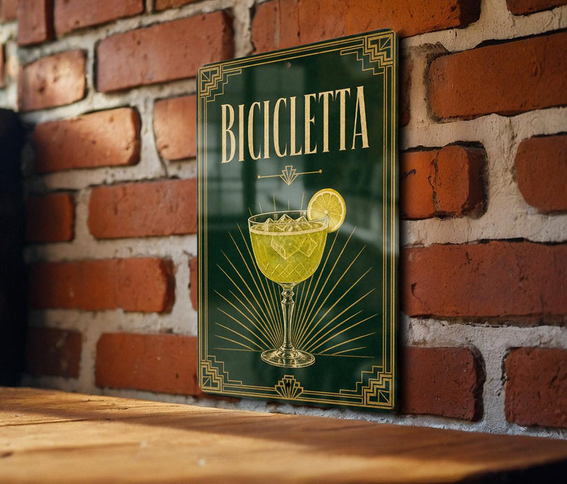 a sign with the word "BIICLETA" on it, which is mounted on a brick wall.