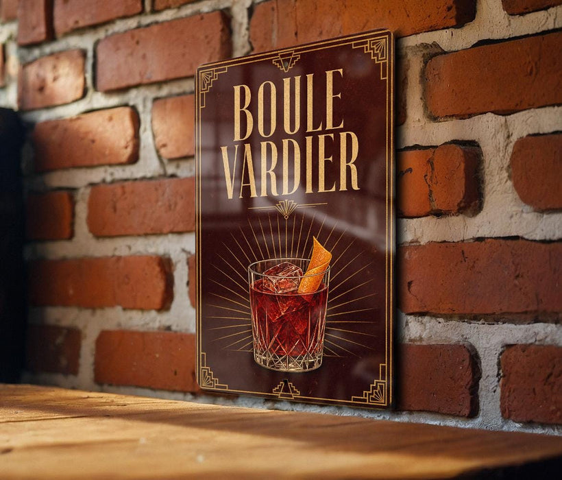 A sign with the text "BOULE VARDIER" and an illustration of a cocktail is displayed on a brick wall.