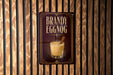A sign for "Bandy Eggnog" is displayed on a wooden wall.